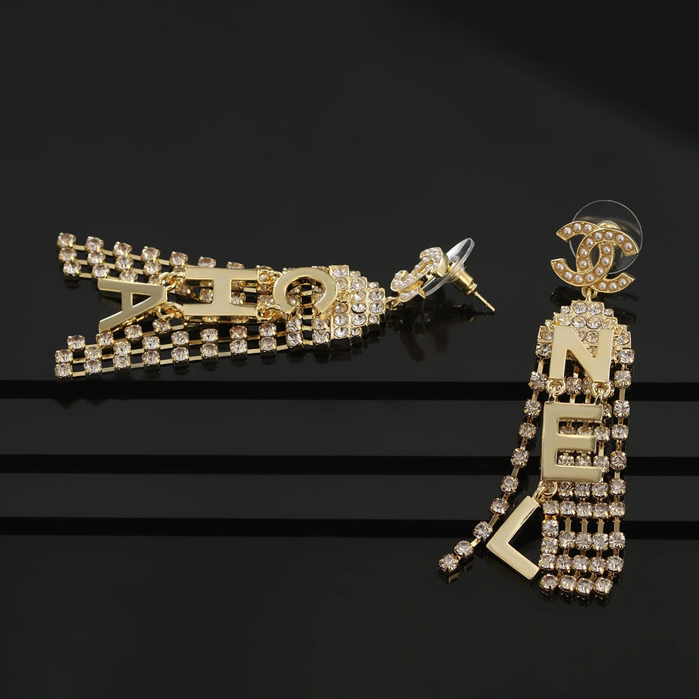 18K Chanel Letter Earrings