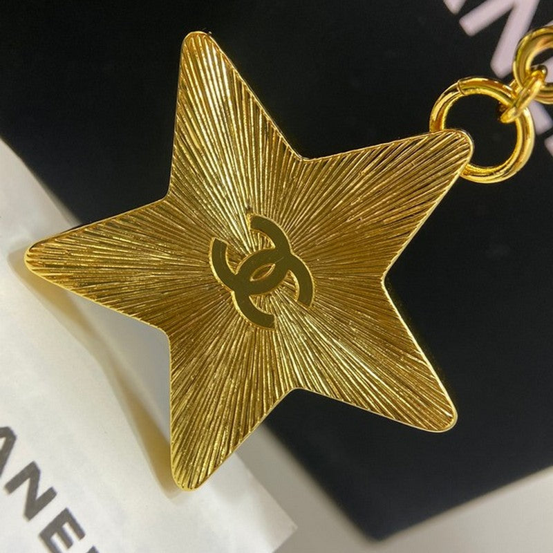 18K Chanel Black Gold Star Brooch