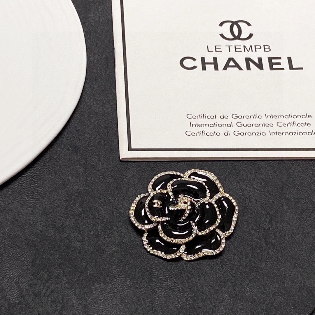 18K Chanel Black Flower Brooch