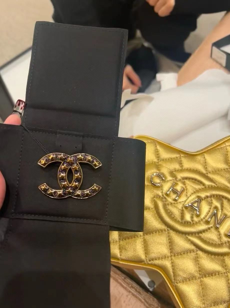 18K Chanel Black Star Brooch