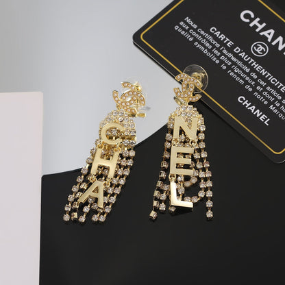 18K  Chanel Letter Earrings