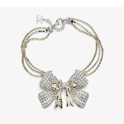 18K  Chanel 25K Bow Tie Choker Necklace