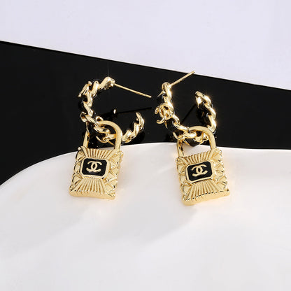 18K  Chanel Lock Earrings