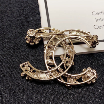 18K  Chanel Crystal Flower Brooch