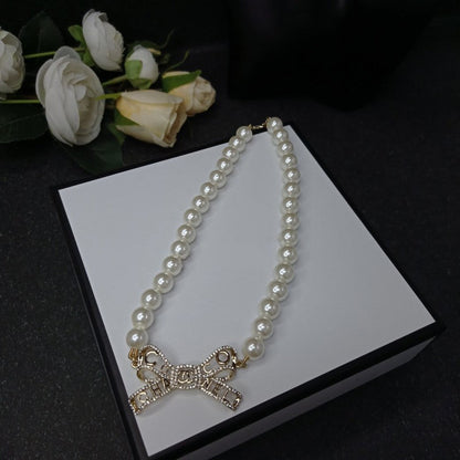 18K  Chanel Bow Pearl Necklace