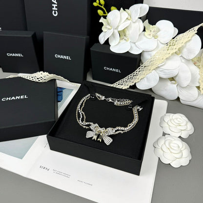 18K  Chanel 25K Bow Tie Choker Necklace