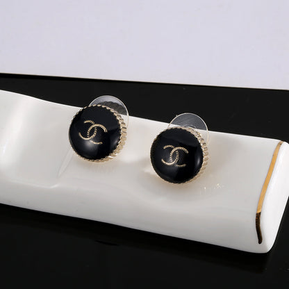 18K  Chanel Circle Black Resin Earrings